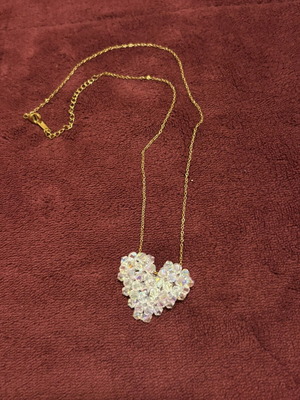 Gold necklace with crystal heart pendant