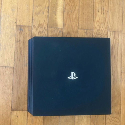 Sony PlayStation 4 Pro 1TB gaming bundle with controller and GTA V
