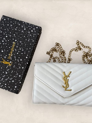 Yves Saint Laurent bag new, white and gold