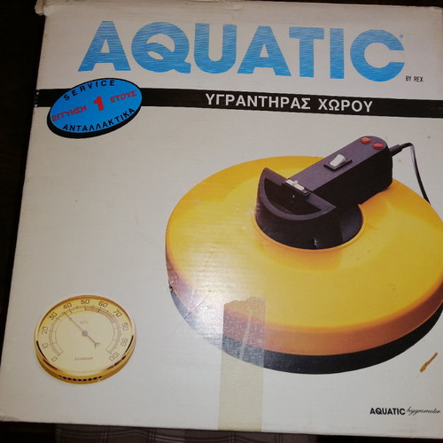 Electric room humidifier with indicator clock in excellent condition