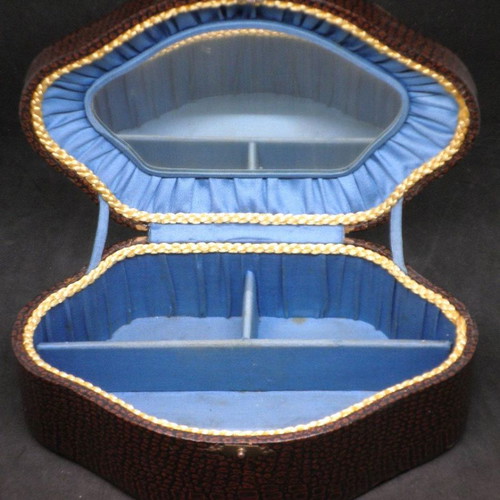 Antique jewelry box used, brown color with blue fabric interior