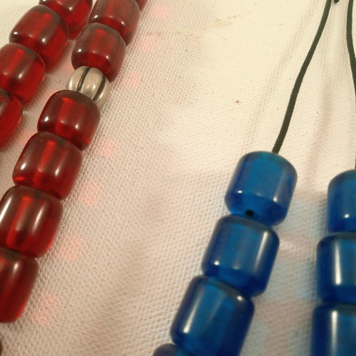 Two worry beads red and blue 30 and 35 cm synthetic with transparent beads