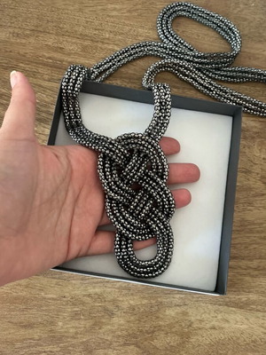 Statement necklace with woven knot in gunmetal color like new