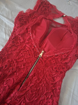 Red embroidered dress with chest transparency and open back, like new