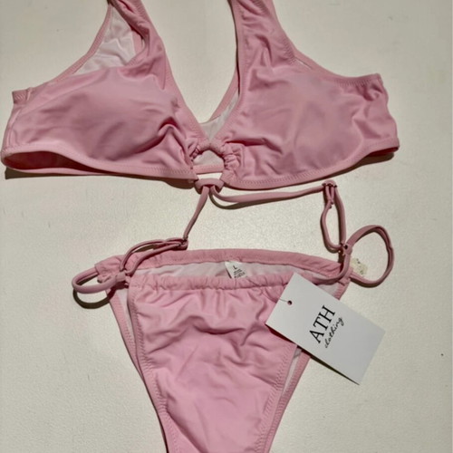 Bikini set new with tags, pink, sizes medium and large