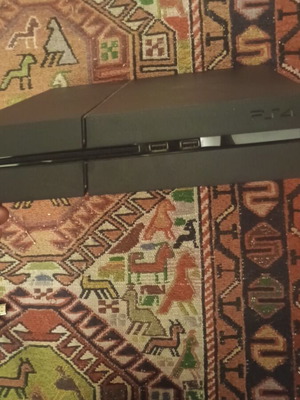 Sony PlayStation 4 like new with controller and games