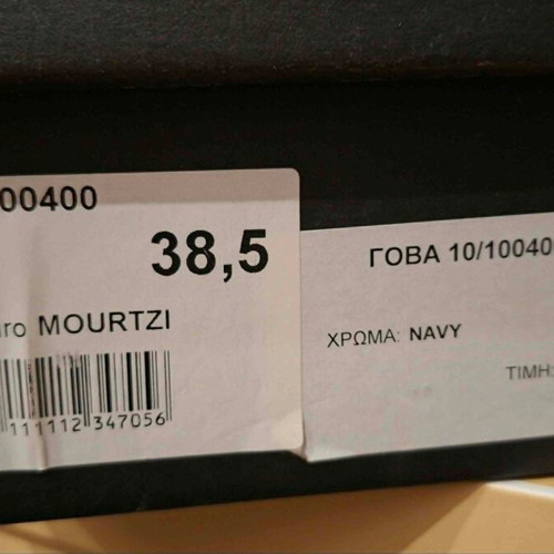 Mourtzi Navy pumps size 38.5 like new