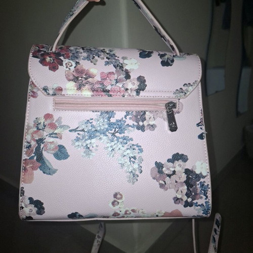 Handbag like new, pink with floral pattern, multiple pockets and strap