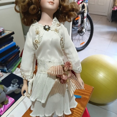 Porcelain doll in excellent condition
