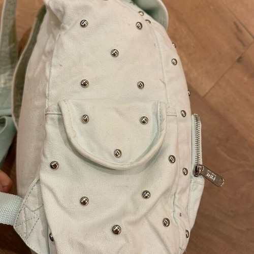 Pink backpack used, fabric turquoise with studs