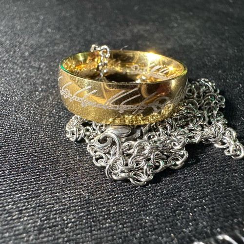 Lord of the Rings ring with chain like new, gold and silver