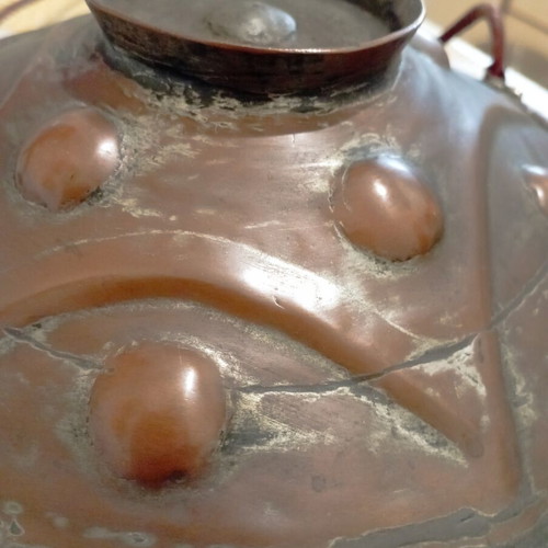 Traditional copper flask used with leather strap