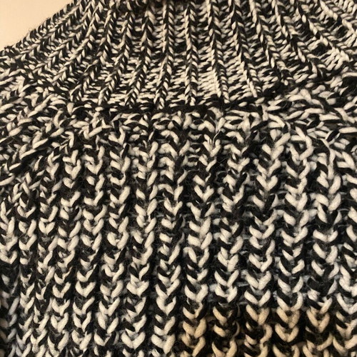 Women's black and white pullover with high collar like new