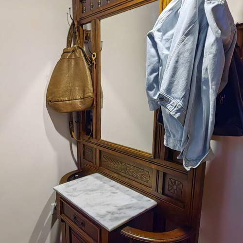 Antique solid walnut entryway furniture with carving, mirror and marble
