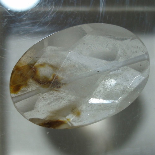 Mineral quartz with included oxides like new