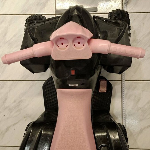 Children's electric ATV like new, black with pink details