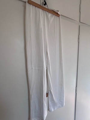 White knitted straight-leg pants like new