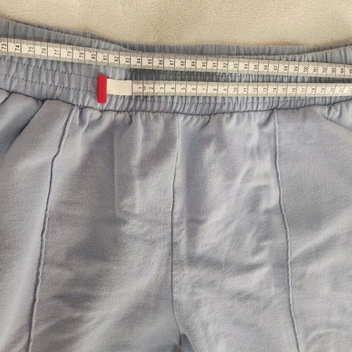 Sky blue jumpsuit in a wide straight line.