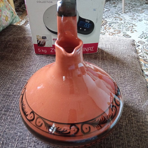 Ceramic wine jug like new with painted border