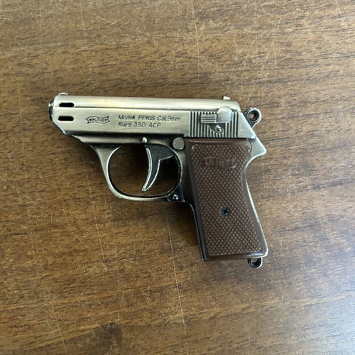 Gun-shaped lighter with case