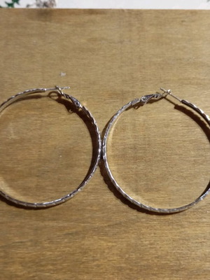 Earrings used, silver color