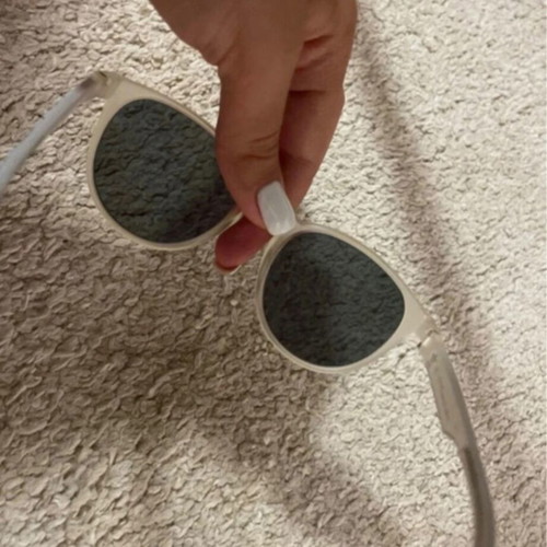 Adidas Originals sunglasses with transparent frame and purple mirror lenses