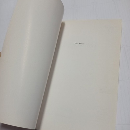 De Chirico L Unita book foreign language Italian like new
