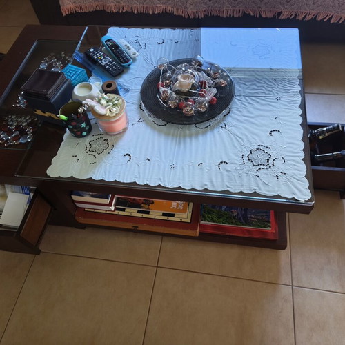 Coffee table used with four drawers and hidden compartment, wood