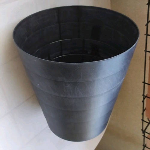 Plastic flowerpot used, black color, height 31 cm