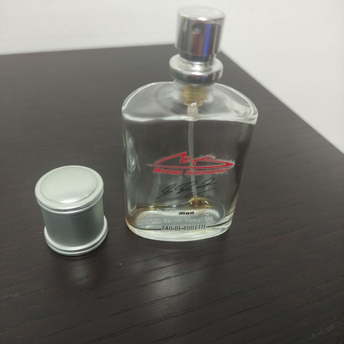 Empty Versace, Hugo Boss and Michael Schumacher perfume bottles used, collection pack