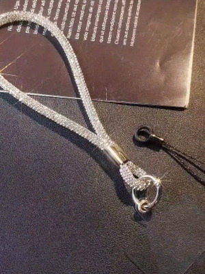 Mobile phone strap new with rhinestones in silver color