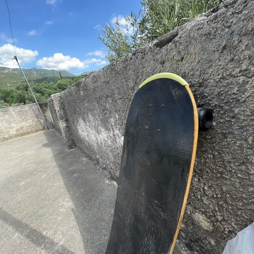 Old School Skateboard used with worn wood for tricks