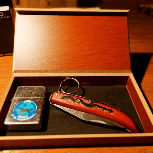 Collectible Zippo lighter 32 years old and handmade Okapi knife.