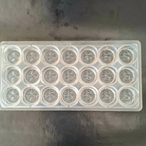 Polycarbonate mold for round chocolates used, 21 cavities