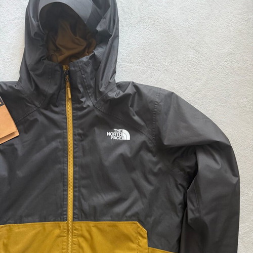 The North Face Millerton jacket like new, windproof, waterproof, black and gold