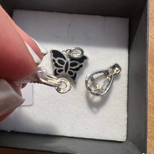 Silver 925 pendants like new, pack with Eiffel tower, butterfly, and hot air balloon