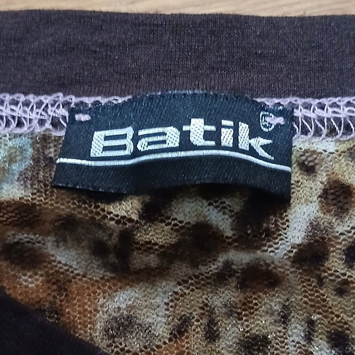 Batic sleeveless floral women's top with mixed animal print, like new, size M