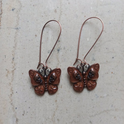 Handmade metal butterfly and skull earrings new, brown