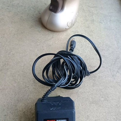Skil cordless screwdriver used with original charger