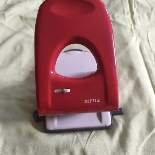 Leitz 5138 heavy duty hole puncher, red handle