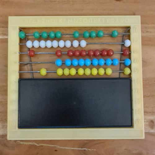 Yellow plastic abacus up to 50 with alphabet and 1980s blackboard like new