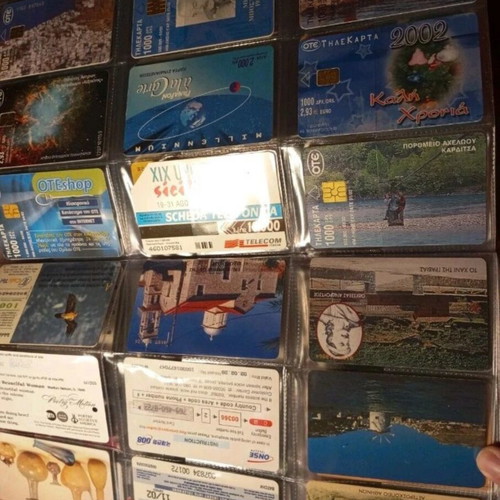 Phone card album like new, 75 cards from various countries and Greece
