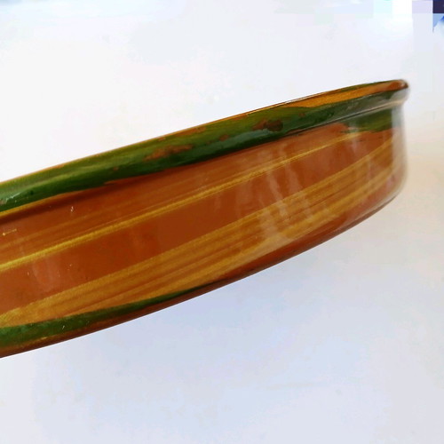 Clay platter with painted border like new