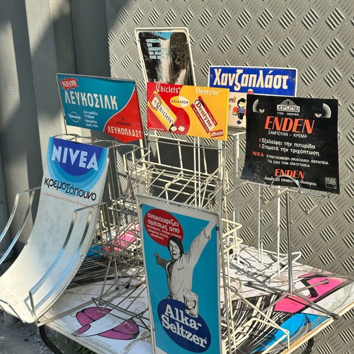 Retro kiosk stand used with authentic vintage advertisements