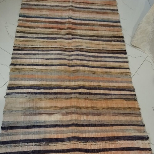 Kilim runner rug used with wear at fringes