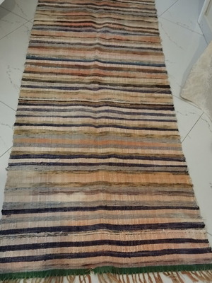 Kilim runner rug used with wear at fringes