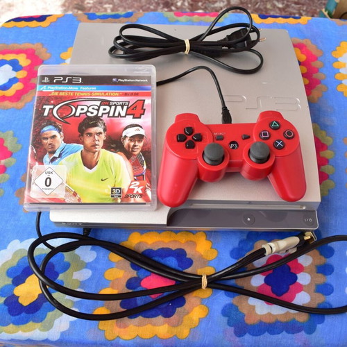 PlayStation 3 Slim 320GB Satin Silver console used with cables and controller