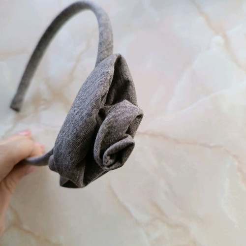 Hairband like new, grey with flower design