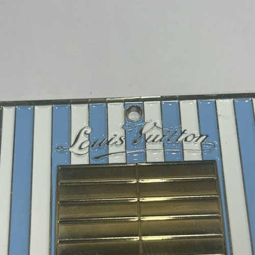 Louis Vuitton Beach Cabin Metal Charm new, multicolor