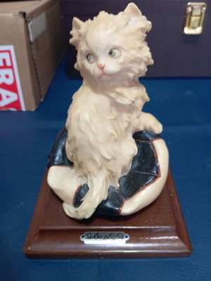 Cat on ball figurine used, height 14 cm